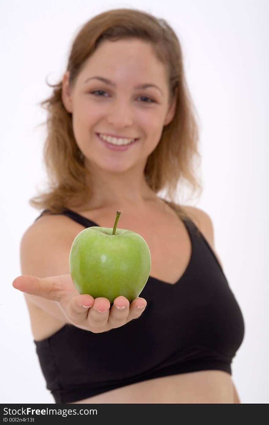 Fitness girl with apple