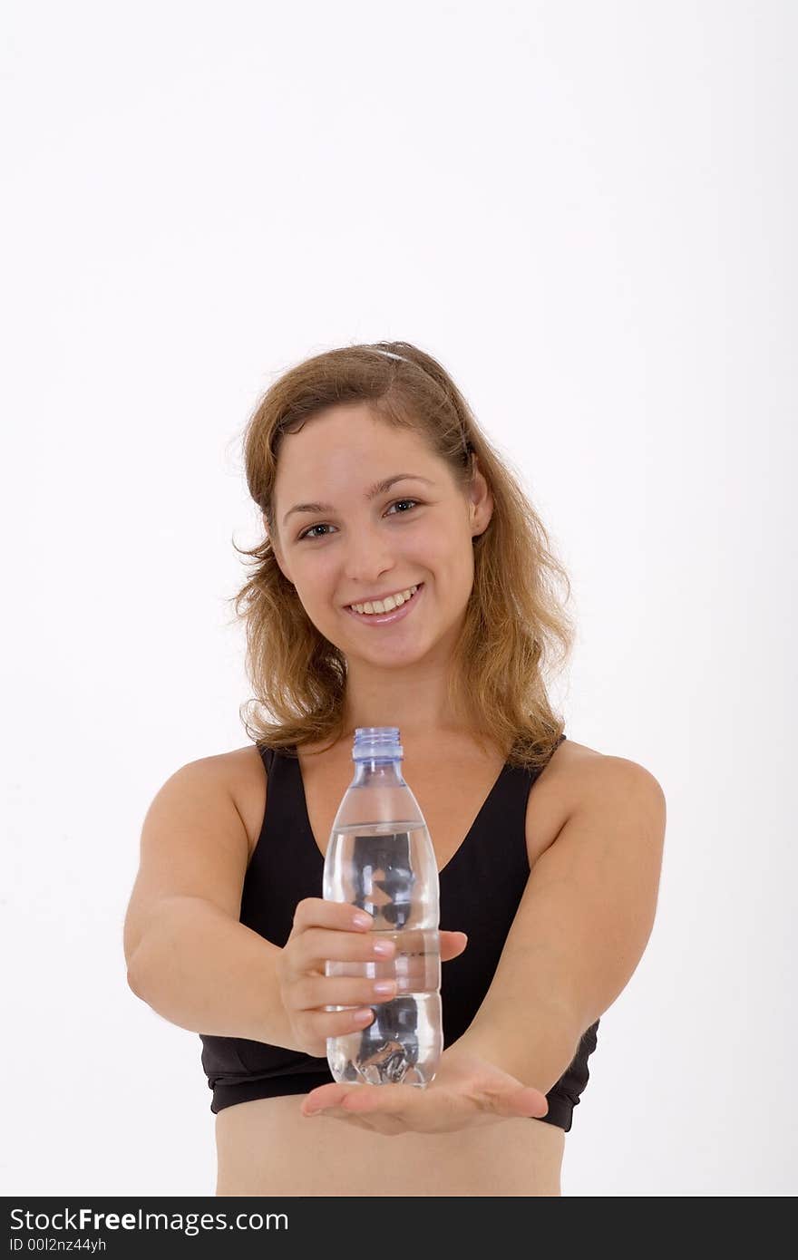 Fitness girl holding a bottle of water. Fitness girl holding a bottle of water