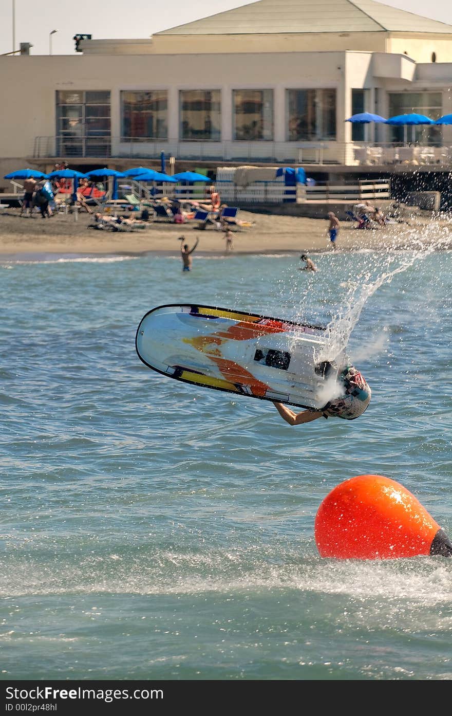 A jetskier jump during a freestyle competition. A jetskier jump during a freestyle competition