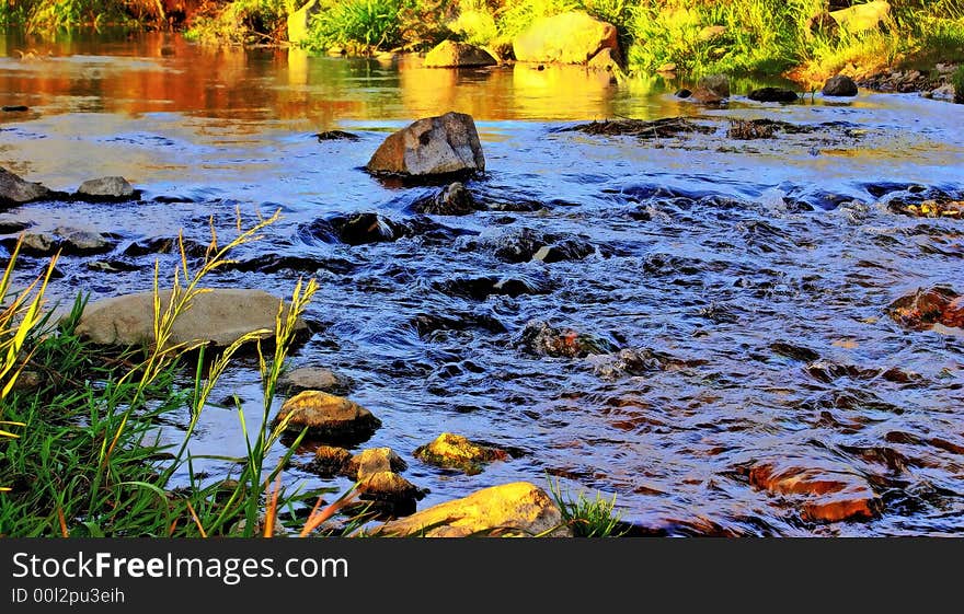 Bewitching, fantastic beauty, a mountain stream. Crystal jets of water, wash a stone loose cheerful sparks. Bewitching, fantastic beauty, a mountain stream. Crystal jets of water, wash a stone loose cheerful sparks.