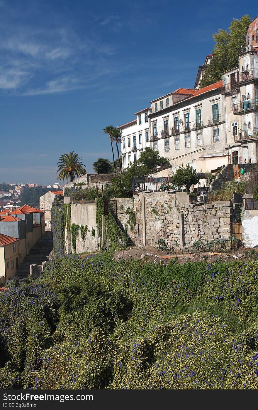 Old houses along the Douro river in Porto (Portugal). Old houses along the Douro river in Porto (Portugal).