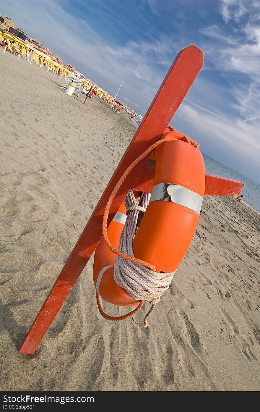 A rescue station with red life buoy. A rescue station with red life buoy