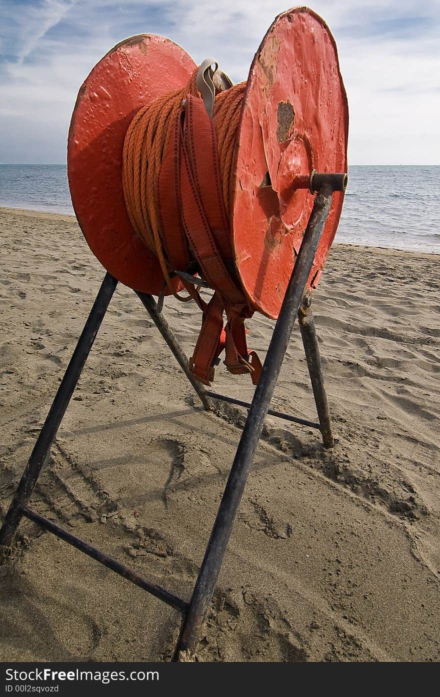 Red rescue line on a desolate beach