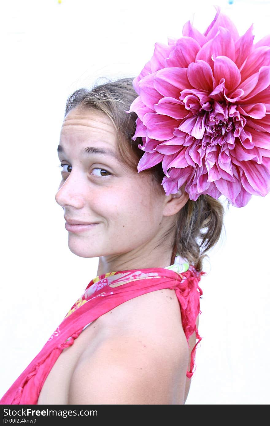 Young woman with flower in hair