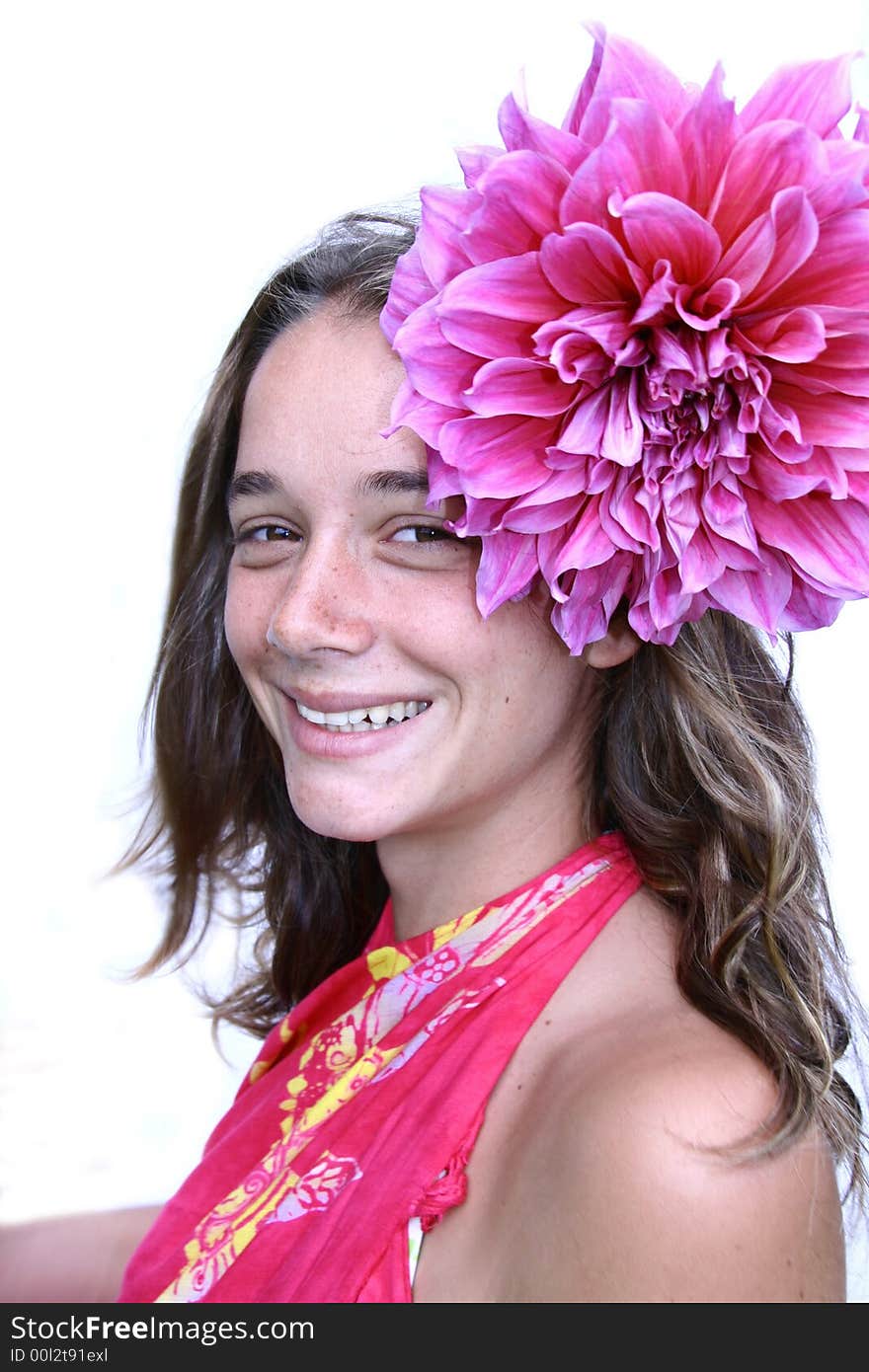 Young woman with flower in hair