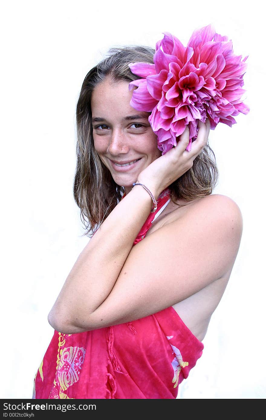 Young woman with flower in hair