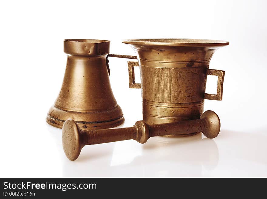 Old Turkish brass coffee brewer and mortar. Old Turkish brass coffee brewer and mortar