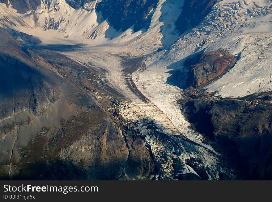 Glacier with crevasses at massif of Jungfrau in Swiss Alps. Glacier with crevasses at massif of Jungfrau in Swiss Alps.