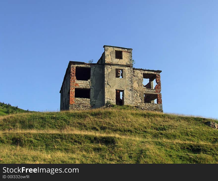 Old and abandoned house stands on the hill