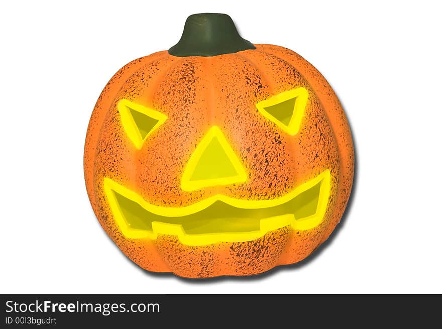 Glowing pumpkin on white background