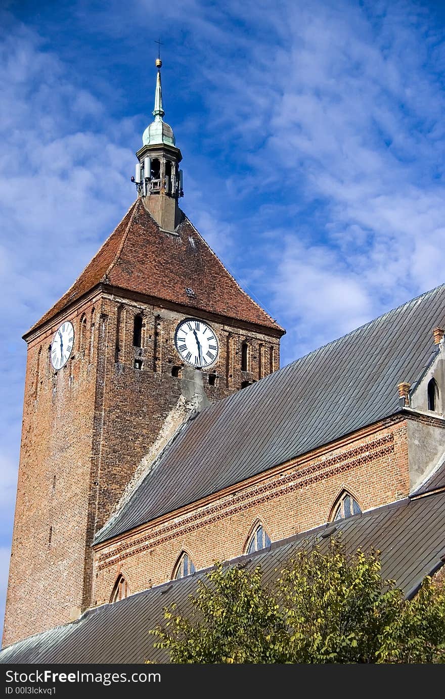 A massive gothic church, clock tower.

<a href='http://www.dreamstime.com/poland--rcollection4309-resi208938' STYLE='font-size:13px; text-decoration: blink; color:#FF0000'><b>MORE PHOTOS OF POLAND »</b></a>. A massive gothic church, clock tower.

<a href='http://www.dreamstime.com/poland--rcollection4309-resi208938' STYLE='font-size:13px; text-decoration: blink; color:#FF0000'><b>MORE PHOTOS OF POLAND »</b></a>