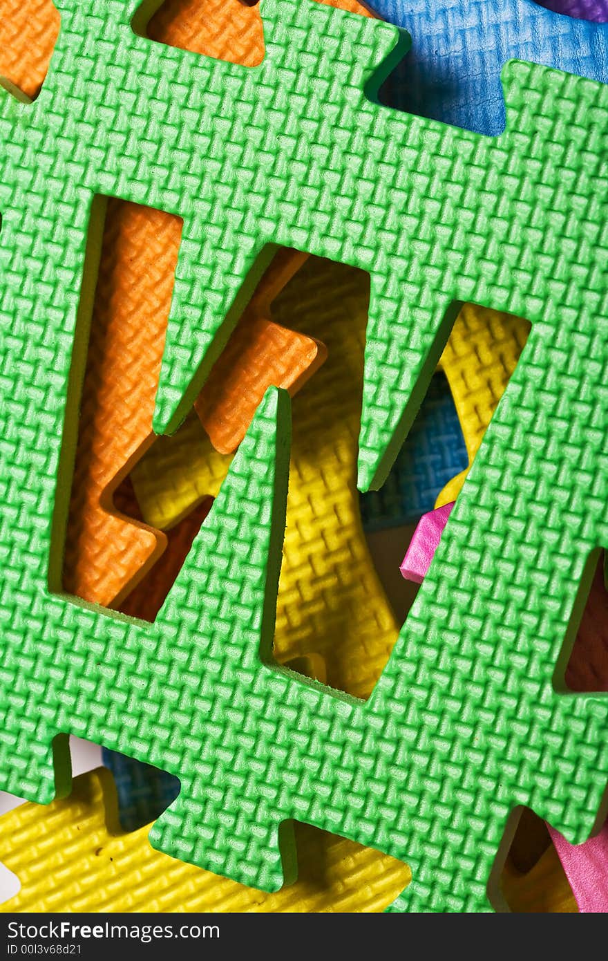 Close up view of the letter W on the color background