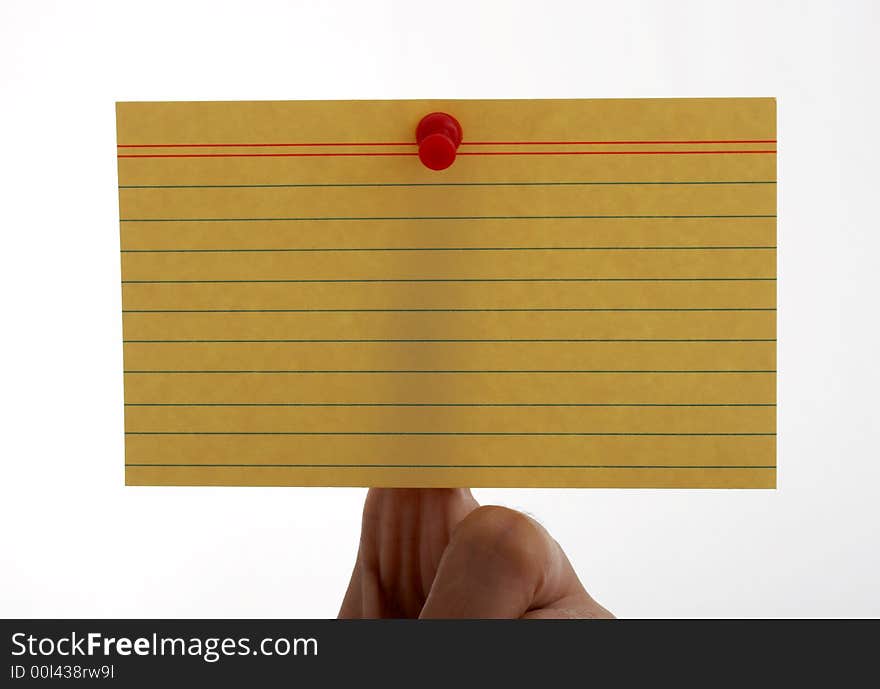 A blank card pinned on a hand