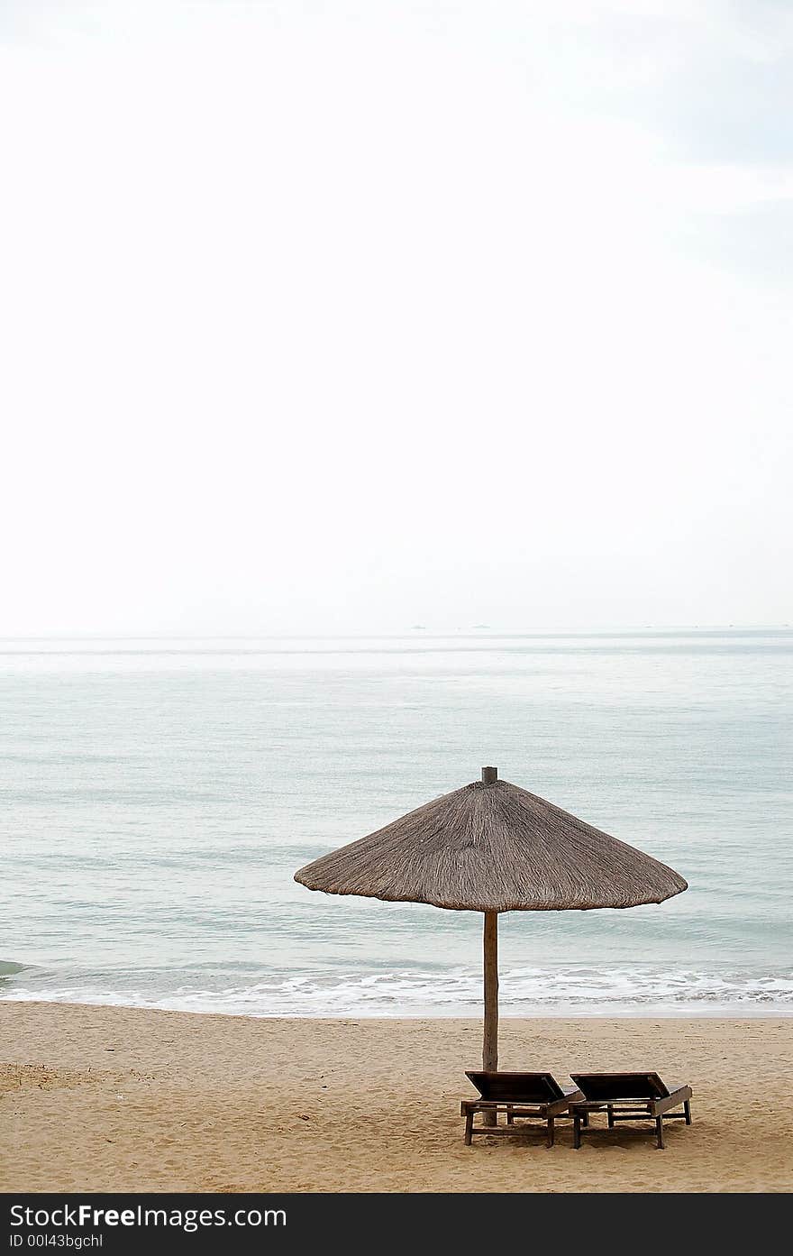 Beach umbrella and chairs