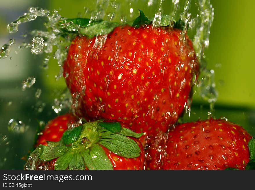 Strawberry fruit in the clean water. Strawberry fruit in the clean water