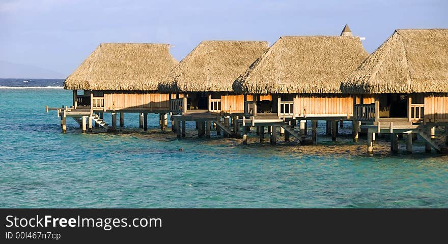 Tropical lagoon with over the water bungalow. Tropical lagoon with over the water bungalow