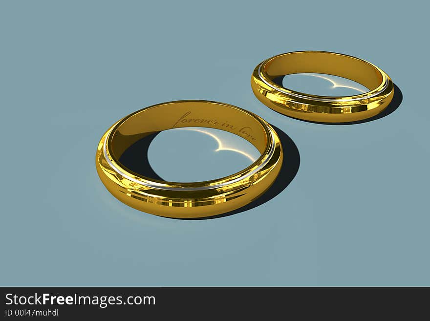 Two golden wedding rings on blue background