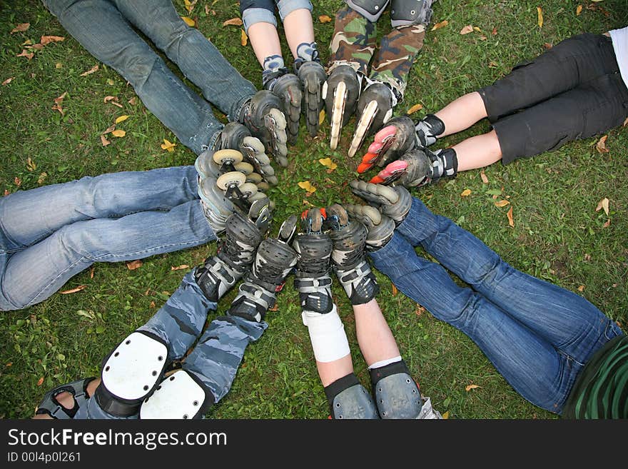 Circle from foots with roller skates. Circle from foots with roller skates