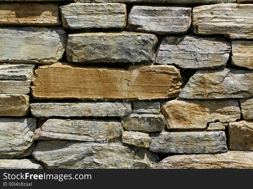 Water Running Over Wet Rock Background. Water Running Over Wet Rock Background.