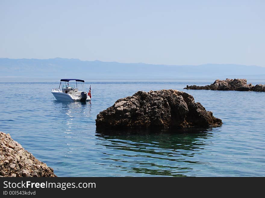 Boat at anchor off the island of Cres, Croatia