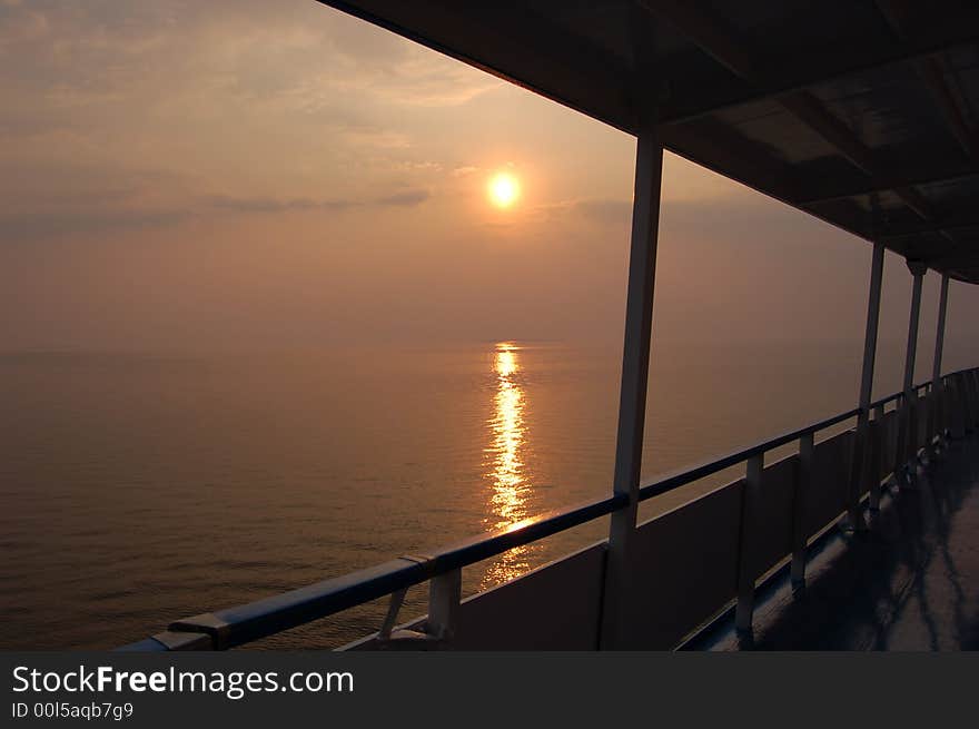 Sea sunset, view at the ship deck. Sea sunset, view at the ship deck