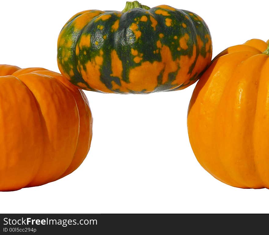 3 pumpkins isolated stacked on top of each other forming a border or frame.