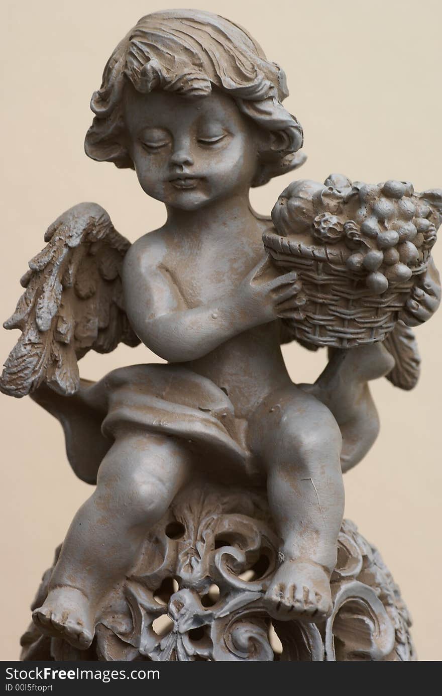 Isolated angel with fruit basket. Isolated angel with fruit basket.