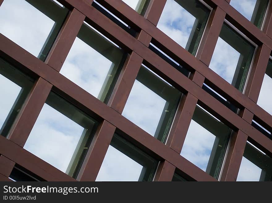 Architectural element, wooden framing over the glass wall. Architectural element, wooden framing over the glass wall