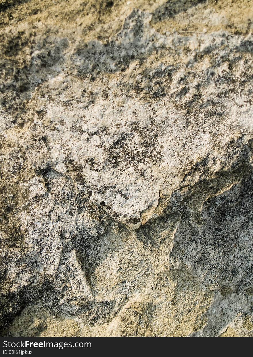 Rock texture shot close-up which can be use as background. Rock texture shot close-up which can be use as background