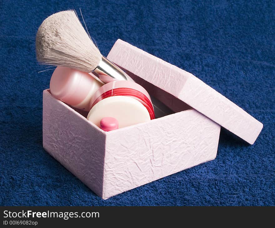 Box with cosmetics and toiletr