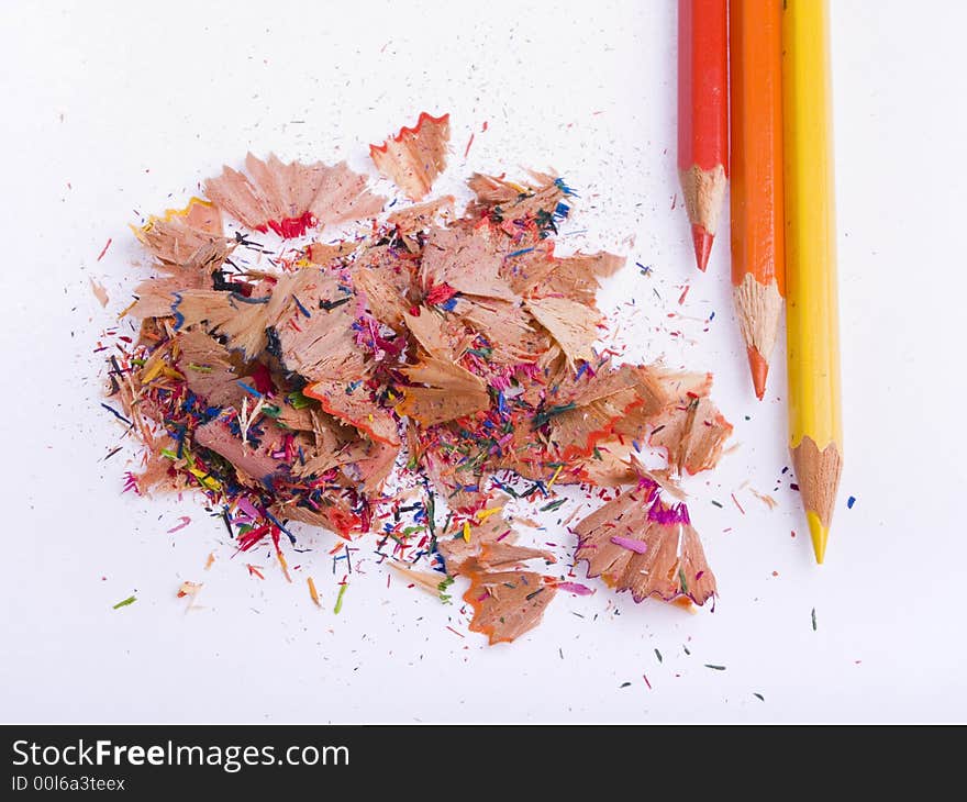 Coloured pencils and shavings
 on a white background