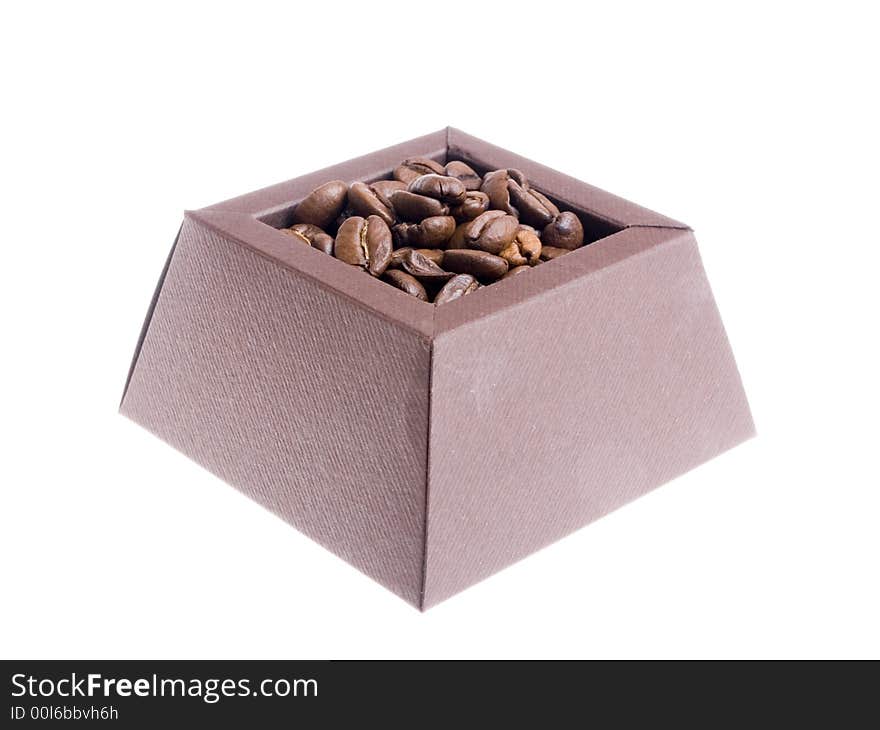 Coffee beans in the brown box on the white background