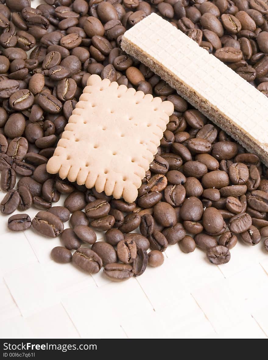 Coffee beans and biscuit