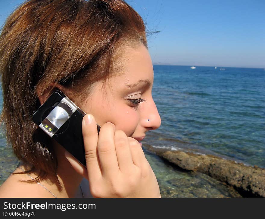 Woman Talking To The Phone