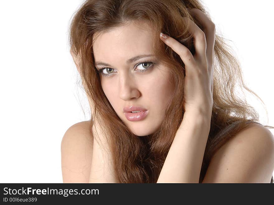 girl with brown hair on the white background close-up. girl with brown hair on the white background close-up