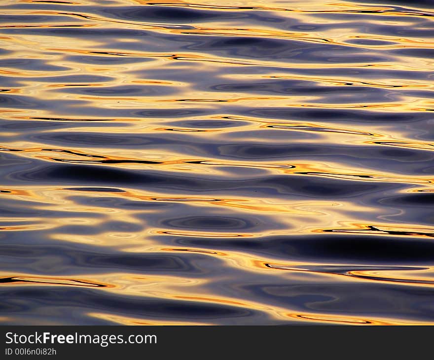 Colorful reflection in small waves