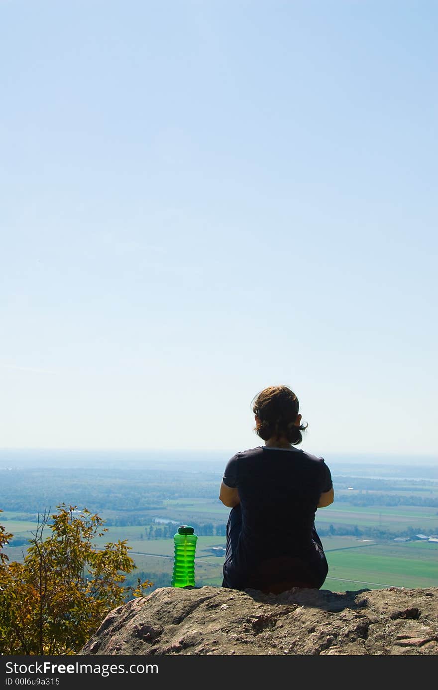 Healthy woman on top of a mountain. Healthy woman on top of a mountain