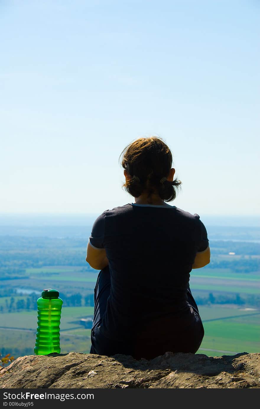 Healthy woman on top of a mountain. Healthy woman on top of a mountain