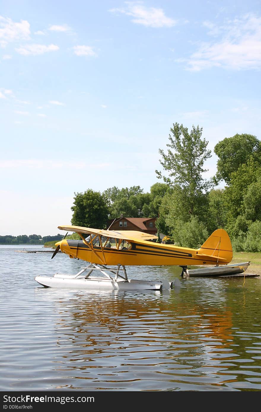 A floatplane sits on the lake waiting to take off