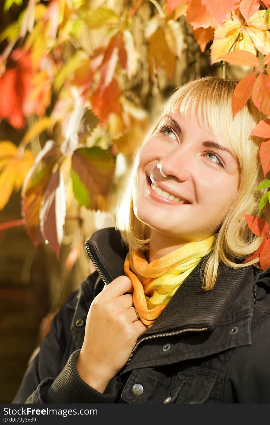 Girl on autumn background