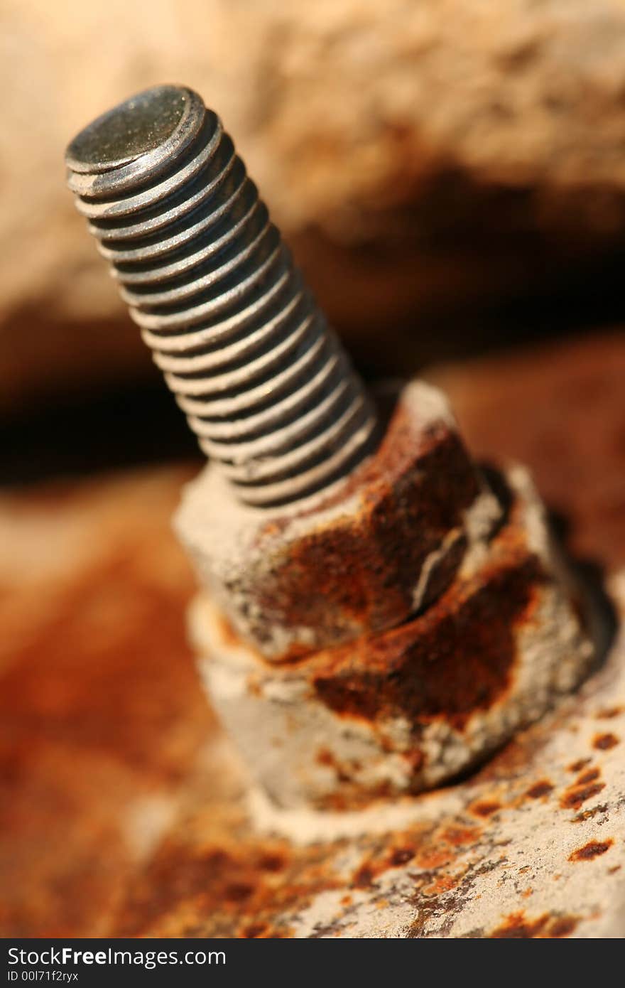 Close-up of rusty bolt of old construction