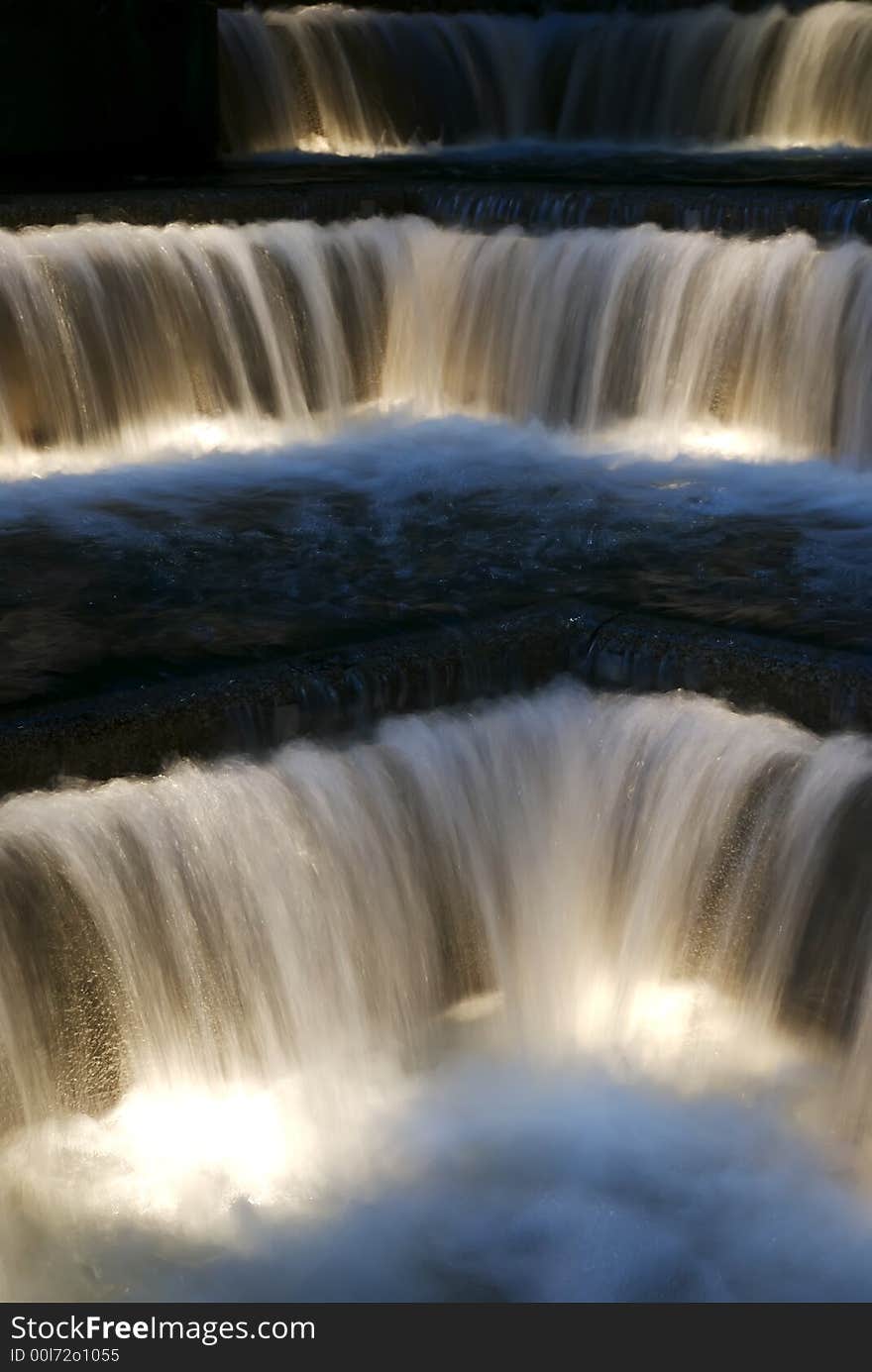 An urban fountain outside a downtown high rise. An urban fountain outside a downtown high rise.