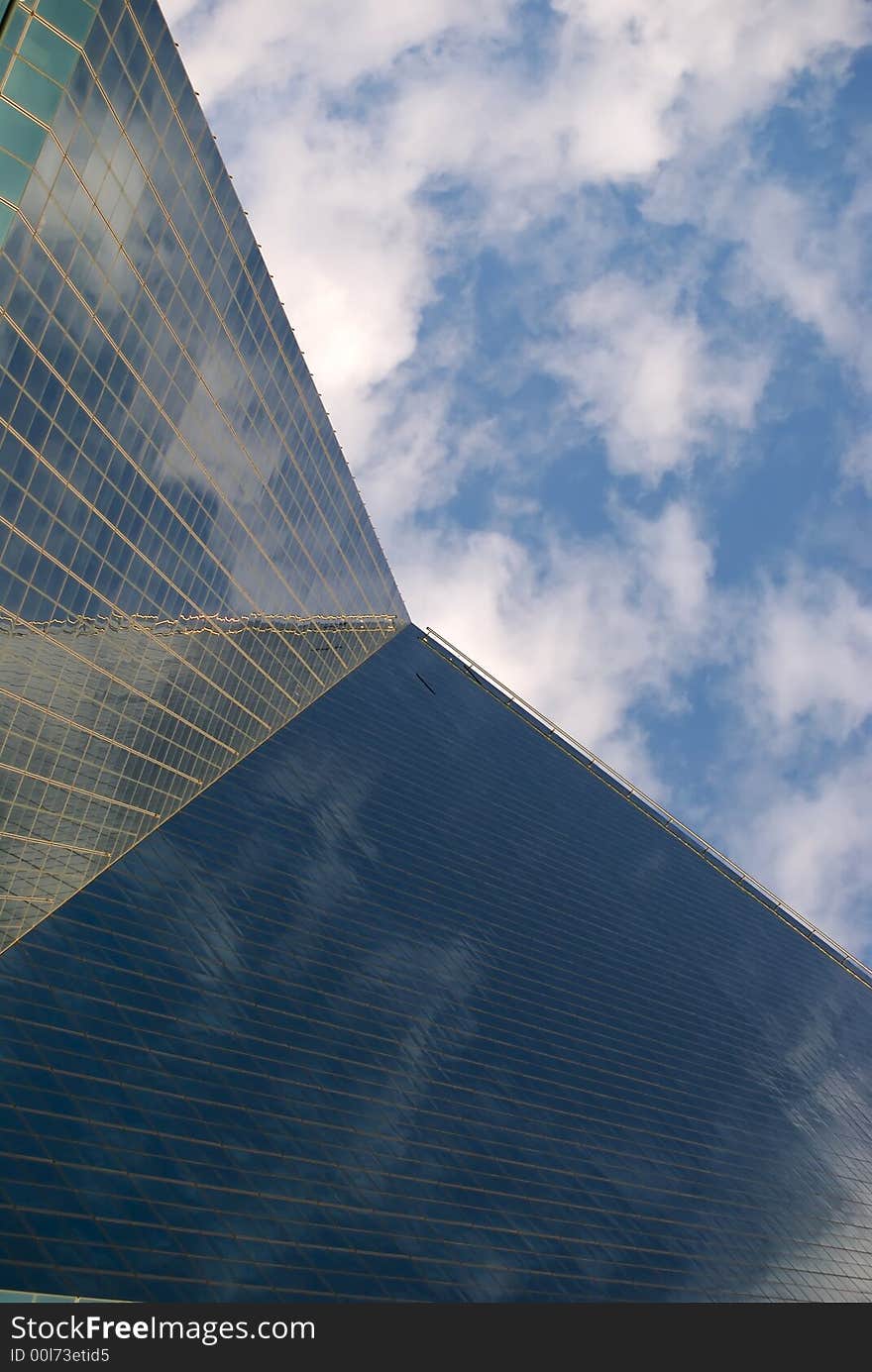 Clouds reflecting off of a downtown high rise. Clouds reflecting off of a downtown high rise.