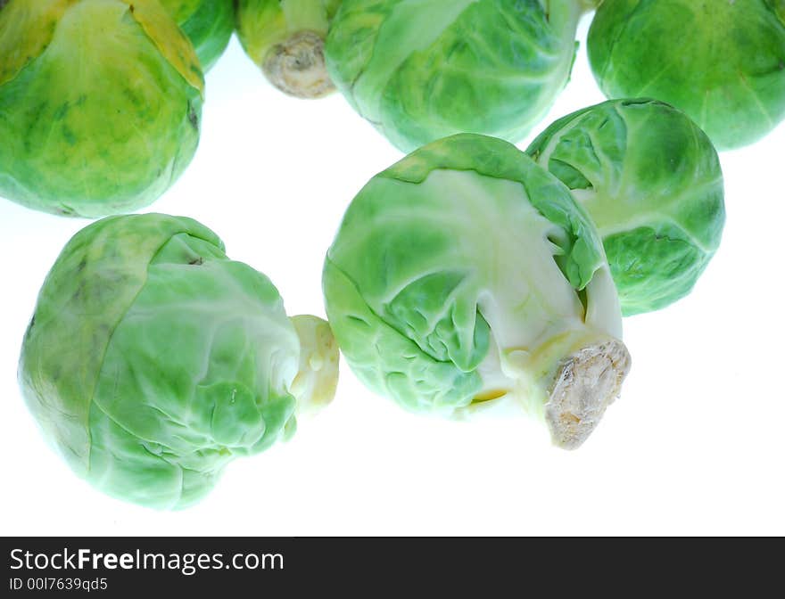 Green cabbages on white background