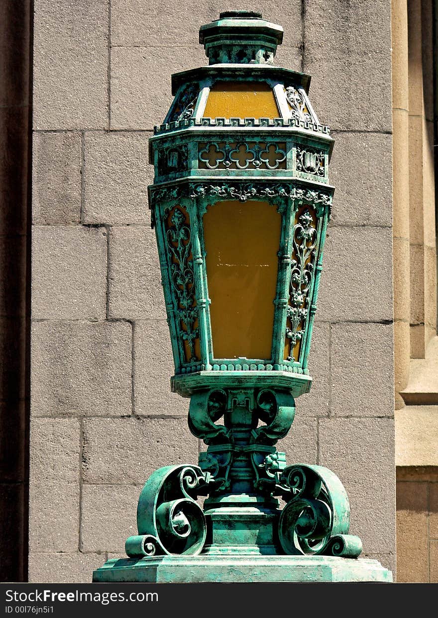 A shot of a classic style lantern out side of a building. A shot of a classic style lantern out side of a building.