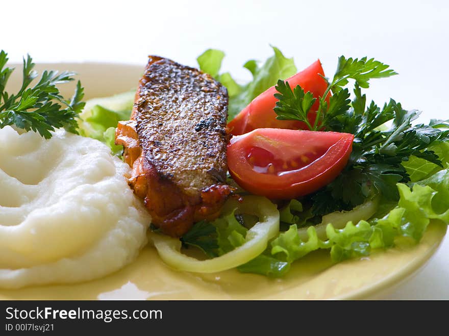 Fried salmon with garnish