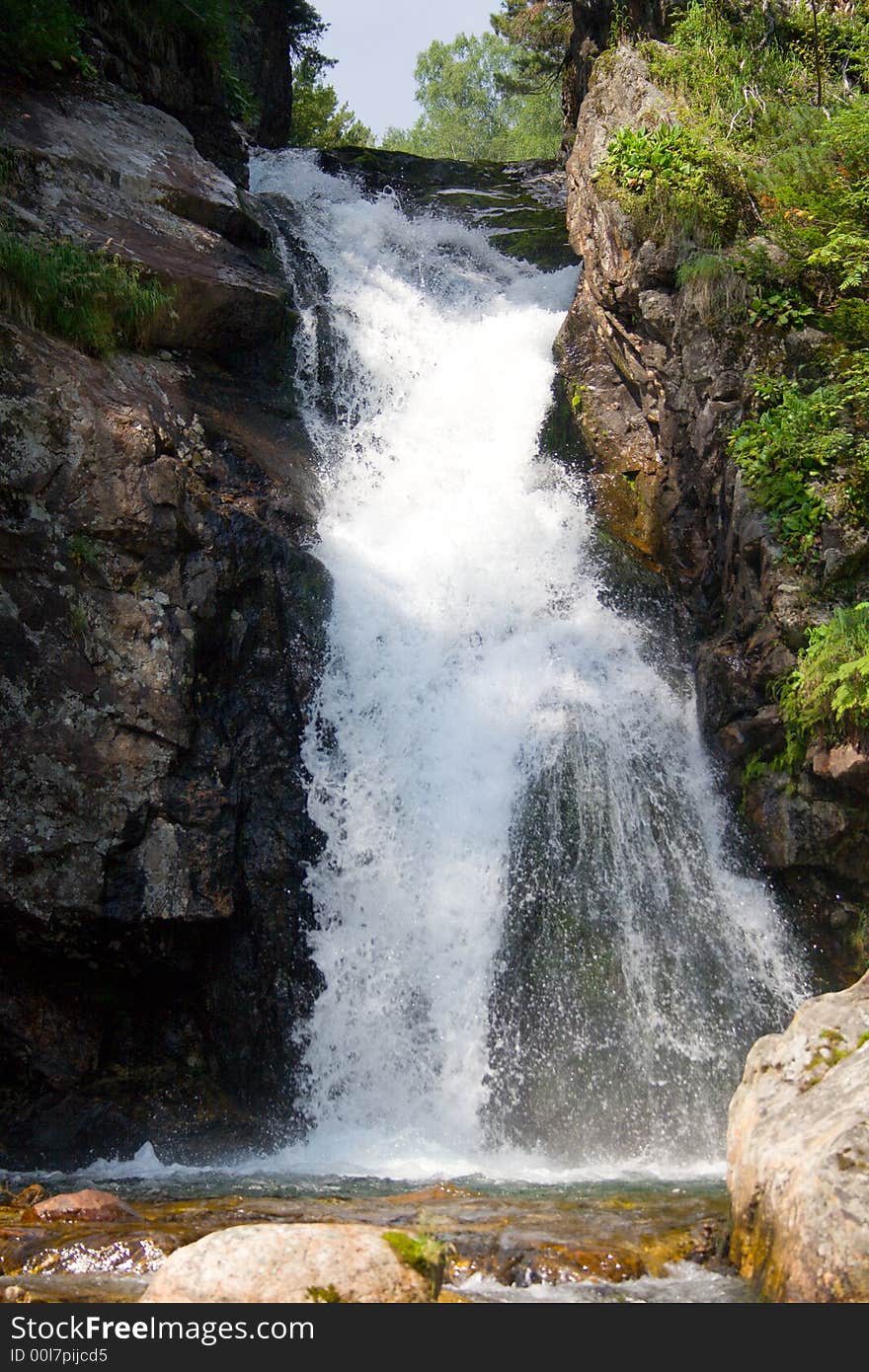 Waterfall grohotun (thunderer) on the same name brook (foothills of Sayan's mountain range)