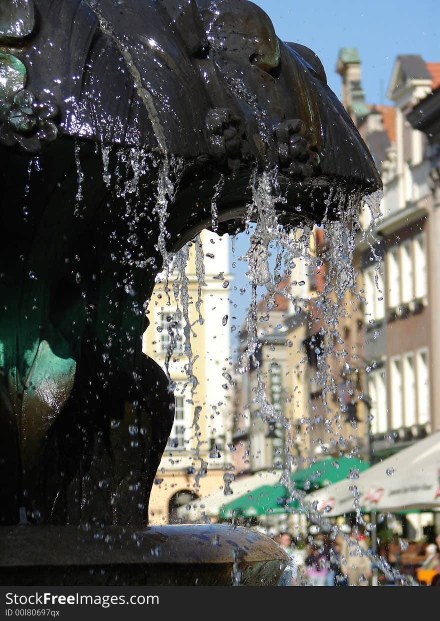 Detail of a fountain in poland, water. Detail of a fountain in poland, water