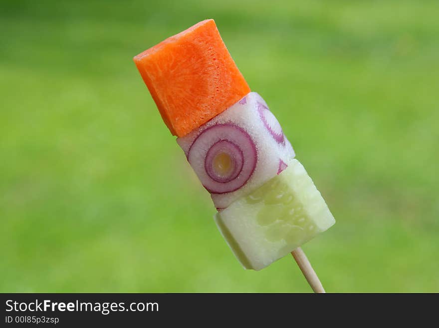 Multi vitamin salad on a dessert stick. Multi vitamin salad on a dessert stick