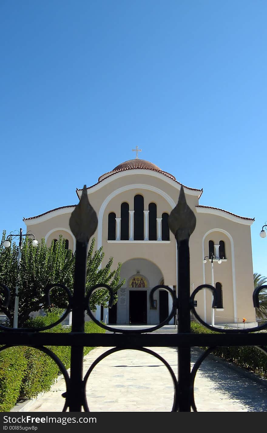 A big orthodox church behind the iron gate. A big orthodox church behind the iron gate